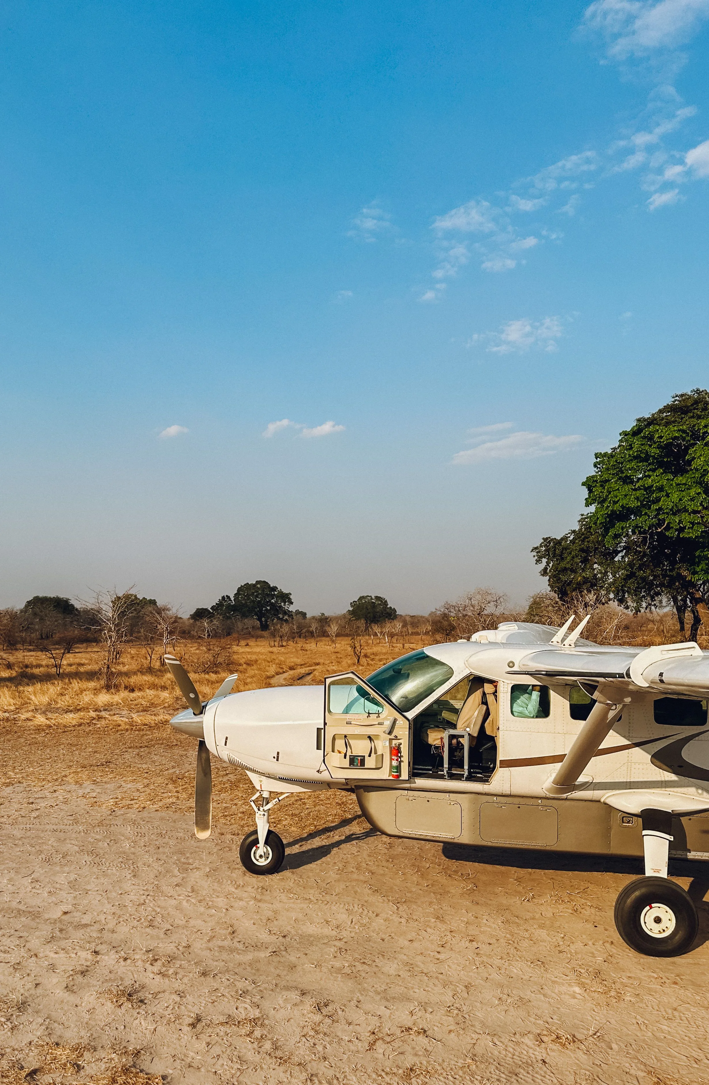 A small charter safari plane on a Namibian bush landing strip