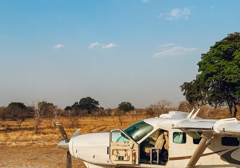 Small safari charter plane on a Namibian airstrip ready for departure